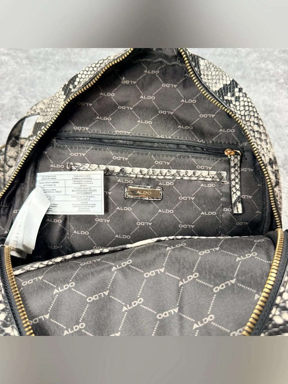 Aldo Black and Cream Snake-Print Mini Backpack